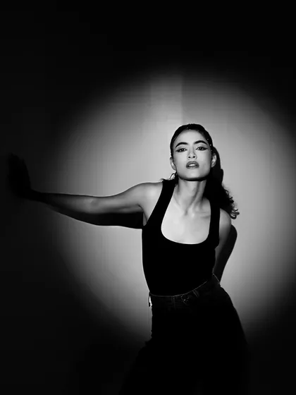 Sometimes, the most powerful portraits are the simplest. Using a single spotlight in a classic black and white style, we can strip away all distractions and focus purely on your expression and form.