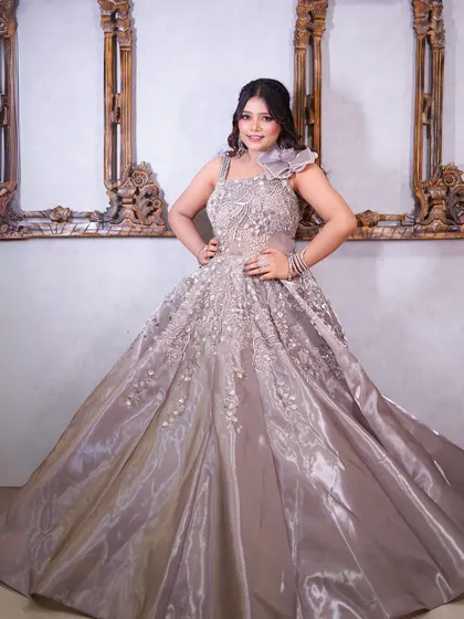 A final full-length view of the elegant grey satin gown.