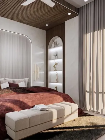 The bedroom is designed for ultimate comfort and style, with a plush bed, a unique fluted headboard, and large windows that let in plenty of natural light. The color palette is warm and inviting.