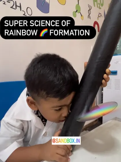 A student peers into our homemade spectroscope, discovering a brilliant rainbow. This activity makes the physics of light tangible and exciting for young learners.