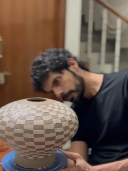 A collection of Prady's finished sgraffito and slip-work pots. His precision with geometric and floral patterns on rounded forms is just incredible.