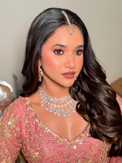 A close up of the reception makeup. The focus is on her beautiful eyes, with a soft smokey look and perfectly defined brows.