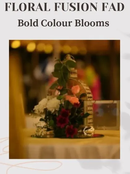 Another "Floral Fusion Fad" example, this image shows a beautiful centerpiece with a mix of colorful flowers, perfect for adding a pop of color to any table.