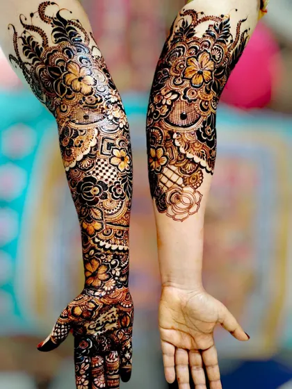 A closer look at the completed arm, highlighting the mix of bold and fine lines.