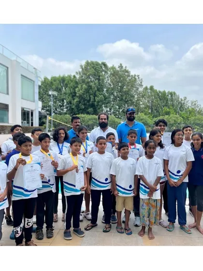 The full team of young athletes with our Head Coach and Senior Coaches at the KSA Sub Junior Mock Swimming Championship. We believe in celebrating every participation and effort.