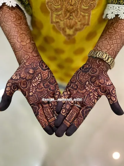 This is the result of just a one-day-old stain. You can see how dark the intricate patterns on the palms and arms have already become.