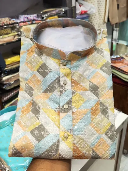 A multi-colored geometric print kurta, a vibrant and modern choice from my Diwali collection.