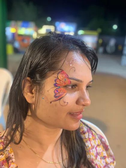 A profile view of the beautiful orange and purple butterfly.