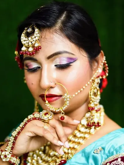 A close-up of the Muslim bridal makeup, showcasing the blended eyeshadow and the intricate details of the henna and jewelry.