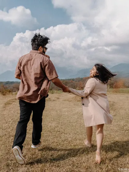 A joyful, candid shot of a couple running through the fields of Bir Billing, the place where their story began. Capturing memories in a meaningful location is what makes a shoot truly special.