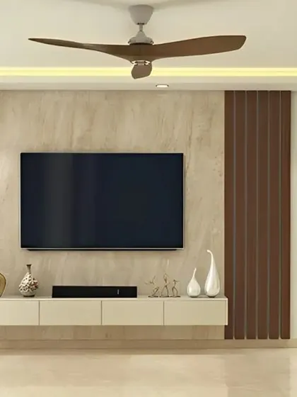 A minimalist TV wall with a floating console and vertical wood panels. This design keeps the living area feeling open and spacious.