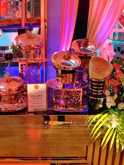 A close-up of our 'Haleem Ways' station, showcasing the beautiful copper serving pots and intricate stands. This setup is perfect for serving traditional Indian delicacies with a touch of royal elegance.