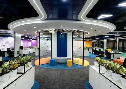 The central hub at the Tata Consumer Products office. Our landscaping plan uses circular arrangements of planters to mirror the architectural flow of the space, creating a dynamic and collaborative atmosphere.