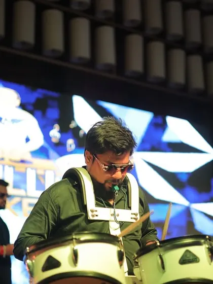 Our drummer with his custom marching drum kit, allowing him to move around the stage and interact directly with the crowd. It's all about creating a dynamic show.