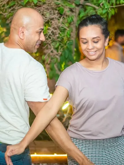 A gentle and connected dance, showcasing the trust and partnership that develops on the dance floor.