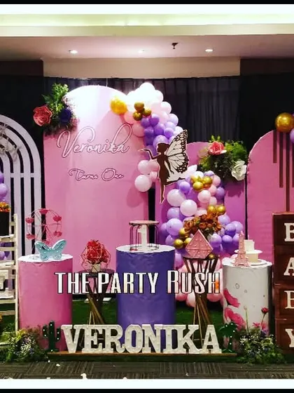 For Veronika's first birthday, I created this magical fairy angel theme. The decor features elegant pink and purple tones, fairy wing silhouettes, and soft lighting to bring a touch of enchantment to the celebration.