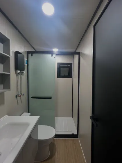 This is a look at a bathroom in one of our container homes. I use modern fixtures, clean lines, and efficient layouts to create a bathroom that is both stylish and highly functional.