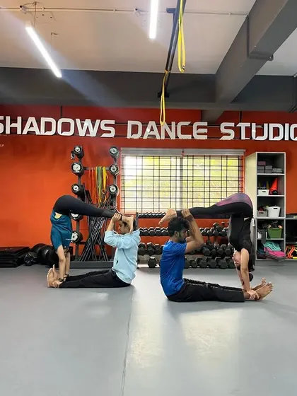 Monday morning motivation from our acro-yoga practitioners. This group pose showcases incredible strength and teamwork.