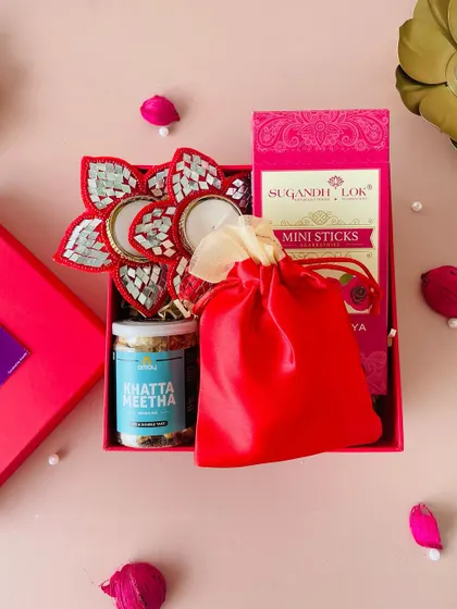 A top-down view of our budget-friendly red box, showing how we create a full and festive look even with a smaller selection of items.