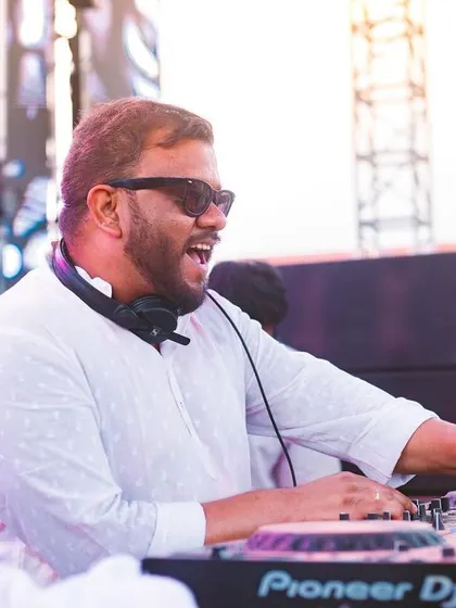 A candid shot of me enjoying the set, with a big smile on my face.