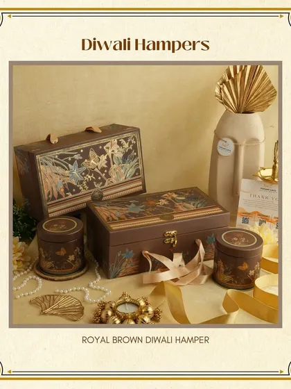 My "Royal Brown" Diwali Hamper collection. These ornate, trunk-style boxes with intricate designs are perfect for a truly luxurious and memorable festive gift.