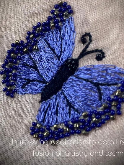 Uncovering dedication to detail. This hand-embroidered butterfly, adorned with beads, shows the fusion of artistry and technique that defines my work.