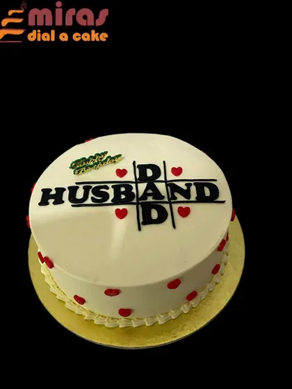 A clever and heartfelt cake for a husband and dad. The design incorporates "Husband" and "Dad" into a tic-tac-toe grid, making it a playful and loving tribute.