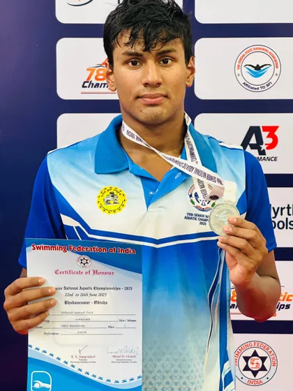 Utkarsh Patil with his silver medal from the 200m Backstroke.