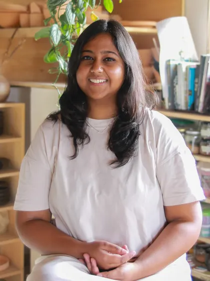 A portrait of Shwetha Sundar, the creator of the 'Moments Together' collection, a testament to her perseverance and hard work.