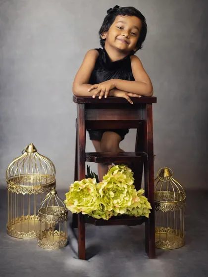 This little girl's happy, confident smile is beautiful. We aim to capture the essence of your child at every age.