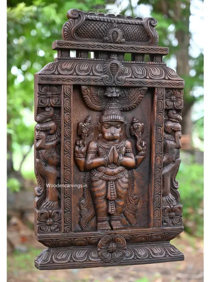 A 24.5-inch wooden Kavadi (portable shrine) featuring Lord Hanuman in a posture of prayer (Namaste).