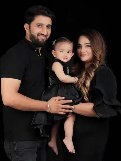 A loving family embrace. This portrait showcases the warmth and security of a family unit, creating a powerful and emotional image.