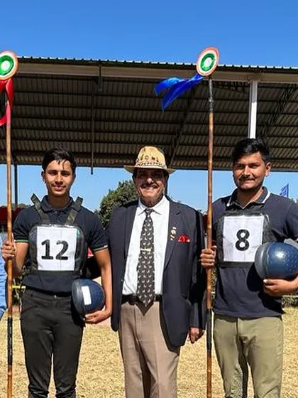 Our riders standing with officials and military personnel, showcasing the formal and disciplined nature of competitive equestrian sports.