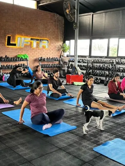 A puppy yoga class in session. Our pups get to roam freely, interacting with participants and building their confidence around new people.