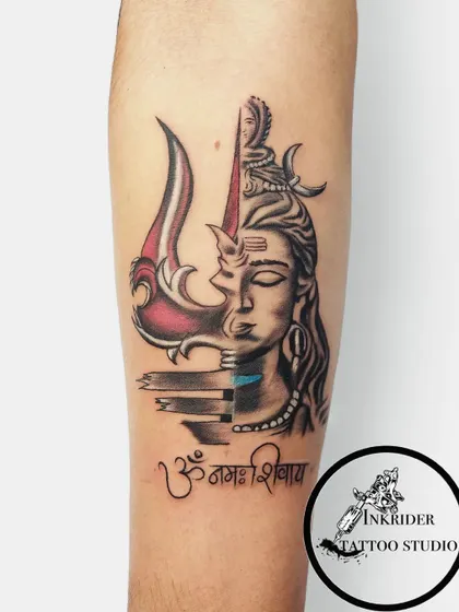 We specialize in transformative cover-ups, like this powerful Mahadev piece. We worked with the client to completely hide an old tattoo with a design that represents strength and divinity, combining detailed portrait work with the iconic Trishul and Om Namah Shivay script.