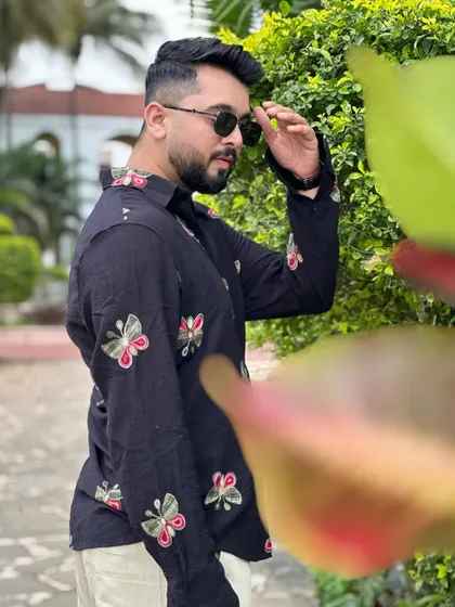 A stylish side profile shot, highlighting the details of my outfit and my confident persona.