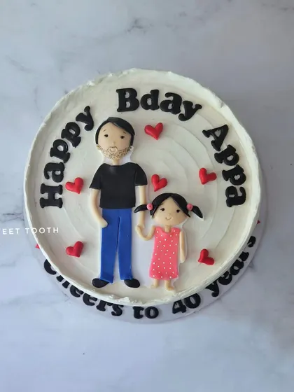 A sweet cake for Appa's 40th birthday. This rasmalai cake features a hand-drawn figurine of a father and his daughter.