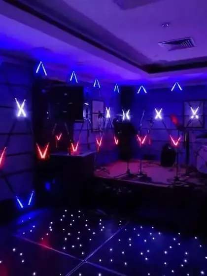 An alternate view of the LED-lit dance floor and stage, ready for a night of music and celebration.