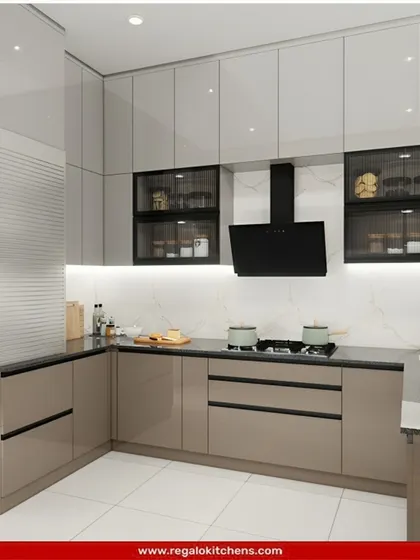 This L-shaped kitchen features a glossy, light brown finish and a black countertop for a sleek, modern look. We included fluted glass cabinets and under-cabinet lighting to add visual interest and functionality.