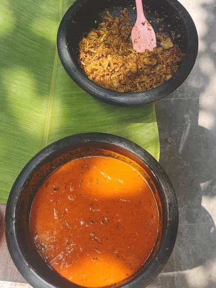A preview of my Vishu Sadya, served in traditional manchatti pots. You can see the vibrant colors of the Jackfruit Thoran and Pumpkin Pulinkari, dishes that are central to the new year feast.