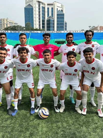 The starting eleven for BTM FC, lined up and ready for action at the Bangalore Football Stadium.