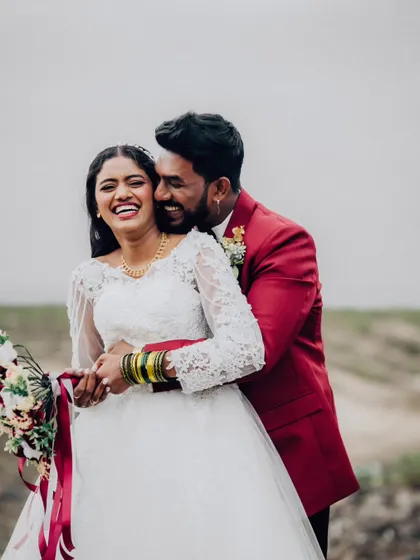 A moment of pure, uninhibited laughter between the couple during their beach photoshoot. These are the real, unfiltered emotions I aim to capture.