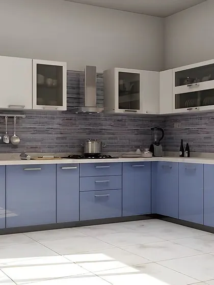 This L-shaped kitchen uses a lovely periwinkle blue for the base cabinets, paired with white uppers. The textured blue backsplash ties it all together for a cohesive and stylish design.