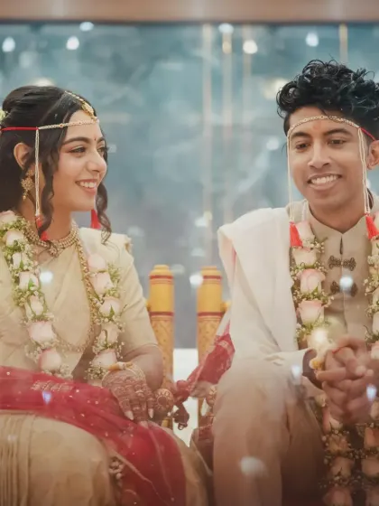 The couple during their wedding ceremony. Sonia's look is a testament to the beauty of simplicity and tradition.