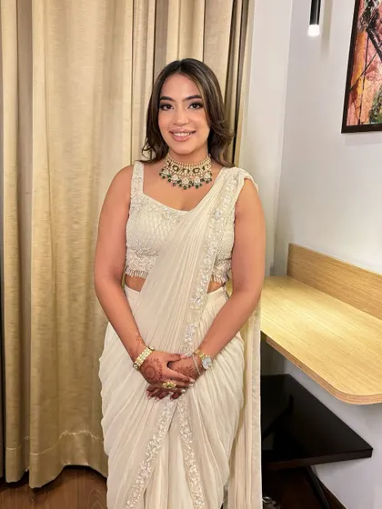 Pranjali looked effortlessly elegant for her engagement. I gave her a soft glam look with a subtle brown smokey eye and nude lips, which looked perfect with her ivory saree.