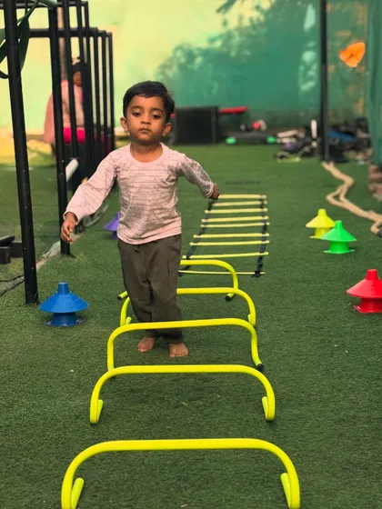 Focus and determination from one of our youngest athletes as he navigates the agility hurdles.