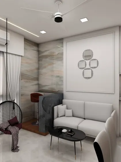 A different view of the compact living room, highlighting a small bar nook and a feature wall with decorative mirrors, making the most of every square foot.
