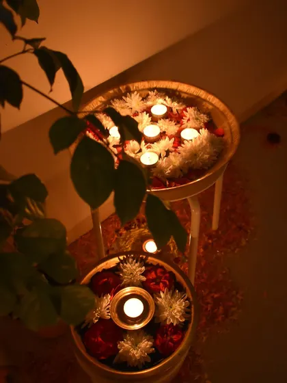 Floating diyas in urlis filled with flowers. This is one of the easiest and most beautiful ways to decorate for Diwali.