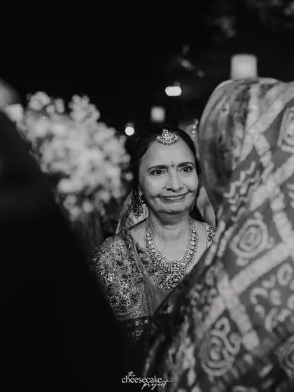A mother's tearful, loving gaze at her daughter during the farewell.