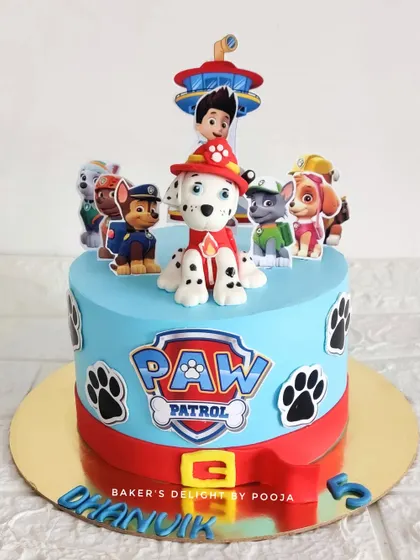 A handcrafted Paw Patrol cake for Dhanvik's 5th birthday. This design features Marshall as the star, along with the rest of the pups, making it a perfect treat for a fan of the show.